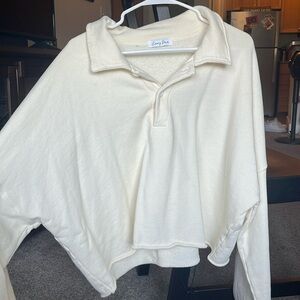 Long sleeve cropped crewneck sweater from Emory Park; oversized fit